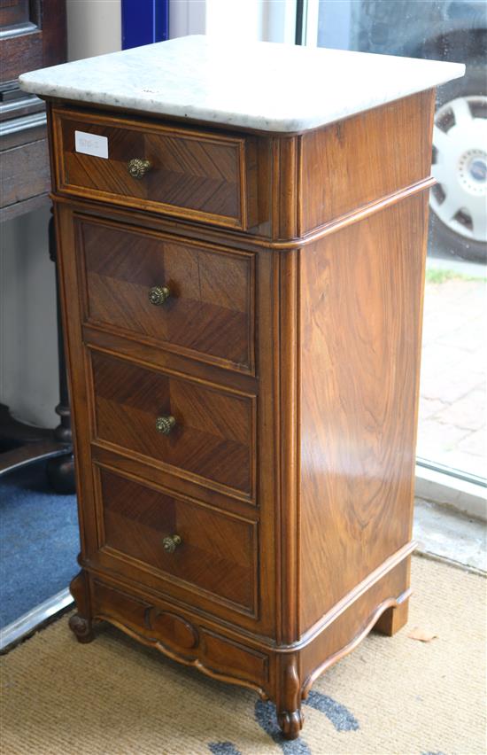 A pair of walnut bedside chests with marble tops W.42cm